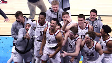 Jalen Suggs #1 of the Gonzaga Bulldogs celebrates with teammates after making a game-winning three point basket in overtime to defeat the UCLA Bruins 93-90 during the 2021 NCAA Final Four semifinal at Lucas Oil Stadium on April 03, 2021 in Indianapolis, Indiana. OKC Thunder (Photo by Andy Lyons/Getty Images)