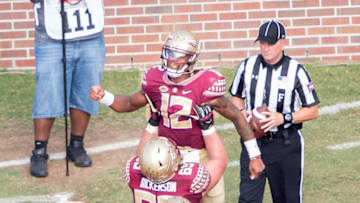TALLAHASSEE, FL - OCTOBER 15: Quarterback Deondre Francois #12 of the Florida State Seminoles celebrates with offensive lineman Landon Dickerson #69 of the Florida State Seminoles after scoring a touchdown during their game against the Wake Forest Demon Deacons at Doak Campbell Stadium on October 15, 2016 in Tallahassee, Florida. (Photo by Michael Chang/Getty Images)
