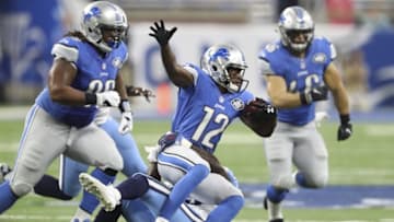Sep 18, 2016; Detroit, MI, USA; Detroit Lions wide receiver Andre Roberts (12) is tackled by Tennessee Titans inside linebacker Wesley Woodyard (59) during the first quarter at Ford Field. Mandatory Credit: Raj Mehta-USA TODAY Sports