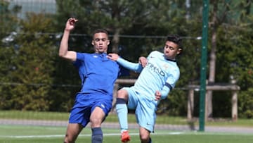 MANCHESTER, ENGLAND - MAY 16: Paolo Fernandes of Manchester City contests the ball with Antonee Robinson of Everton during the U18 Premier League match between Manchester City and Everton at The Academy Stadium on May 16, 2015 in Manchester, England. (Photo by Pete Norton/Getty Images)