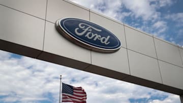 CHICAGO, IL - JUNE 20: A sign sits in front of a Ford dealership on June 20, 2017 in Chicago, Illinois. Ford announced it will move production of the Focus from their Wayne, Michigan facility to China instead of Mexico as originally planned. The new Ranger and Bronco are scheduled to be built in Wayne. (Photo by Scott Olson/Getty Images)