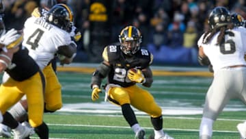 IOWA CITY, IOWA- NOVEMBER 18: Running back James Butler #20 of the Iowa Hawkeyes rushes up field during the second quarter against the Purdue Boilermakers on November 18, 2017 at Kinnick Stadium in Iowa City, Iowa. (Photo by Matthew Holst/Getty Images)