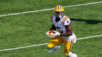 Oct 10, 2020; Columbia, Missouri, USA; LSU Tigers wide receiver Terrace Marshall Jr. (6) runs against the Missouri Tigers during the second half at Faurot Field at Memorial Stadium. Mandatory Credit: Jay Biggerstaff-USA TODAY Sports