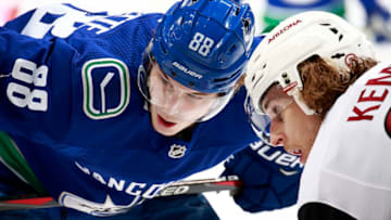 VANCOUVER, BC - JANUARY 10: Adam Gaudette #88 of the Vancouver Canucks and Mario Kempe #29 of the Arizona Coyotes face-off during their NHL game at Rogers Arena January 10, 2019 in Vancouver, British Columbia, Canada. (Photo by Jeff Vinnick/NHLI via Getty Images)"n