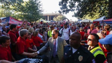 OXFORD, MS - OCTOBER 29: Mississippi Rebels head coach Hugh Freeze greets fans as they walk down the Walk of Champions in the Grove before an NCAA college football game against the Auburn Tigers on October 29, 2016 in Oxford, Mississippi. (Photo by Butch Dill/Getty Images)