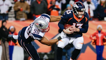 Dec 18, 2016; Denver, CO, USA; New England Patriots defensive end Trey Flowers (98) pressures Denver Broncos quarterback Trevor Siemian (13) in the fourth quarter at Sports Authority Field at Mile High. The Patriots won 16-3. Mandatory Credit: Isaiah J. Downing-USA TODAY Sports