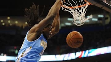 Nov 18, 2013; Oklahoma City, OK, USA; Denver Nuggets power forward Kenneth Faried (35) dunks the ball against the Oklahoma City Thunder during the first quarter at Chesapeake Energy Arena. Mandatory Credit: Mark D. Smith-USA TODAY Sports