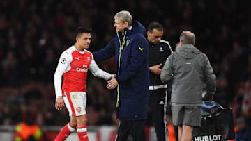 LONDON, ENGLAND - MARCH 07: Alexis Sanchez of Arsenal is consoled by Arsene Wenger, Manager of Arsenal as he is substituted during the UEFA Champions League Round of 16 second leg match between Arsenal FC and FC Bayern Muenchen at Emirates Stadium on March 7, 2017 in London, United Kingdom. (Photo by Shaun Botterill/Getty Images)