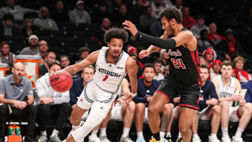 Nov 22, 2022; Brooklyn, New York, USA; Richmond Spiders guard Jason Nelson (1) and Temple Owls forward Zach Hicks (24) at Barclays Center. Mandatory Credit: Wendell Cruz-USA TODAY Sports