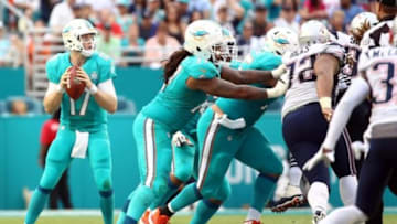 Jan 3, 2016; Miami Gardens, FL, USA; Miami Dolphins quarterback Ryan Tannehill (17) throws a pass against the New England Patriots during the second half at Sun Life Stadium. The Dolphins won 20-10. Mandatory Credit: Steve Mitchell-USA TODAY Sports