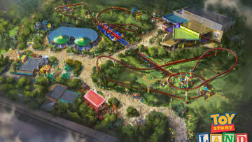 The reimagining of Disney's Hollywood Studios will take guests to infinity and beyond, allowing them to step into the worlds of their favorite films, starting with Toy Story Land. This new 11-acre land will transport guests into the adventurous outdoors of Andy's backyard. Guests will think they've been shrunk to the size of Woody and Buzz as they are surrounded by oversized toys that Andy has assembled using his vivid imagination. Using toys like building blocks, plastic buckets and shovels, and game board pieces, Andy has designed the perfect setting for this land, which will include two new attractions for any Disney park and one expanded favorite. (Disney Parks) Image Acquired from BoxLunch PR