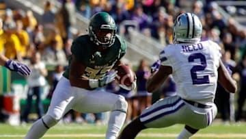 Nov 19, 2016; Waco, TX, USA; Baylor Bears running back Shock Linwood (32) puts the move on Kansas State Wildcats defensive back D.J. Reed (2) during a game at McLane Stadium. Kansas State won 42-21. Mandatory Credit: Ray Carlin-USA TODAY Sports