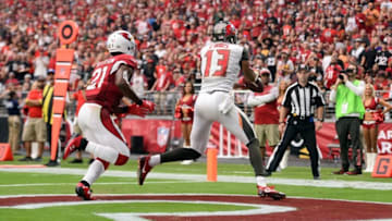 Sep 18, 2016; Glendale, AZ, USA; Tampa Bay Buccaneers wide receiver Mike Evans (13) catches a touchdown pass against Arizona Cardinals cornerback Patrick Peterson (21) during the second half at University of Phoenix Stadium. The Cardinals won 40-7. Mandatory Credit: Joe Camporeale-USA TODAY Sports