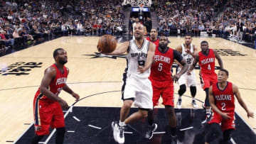 Mar 30, 2016; San Antonio, TX, USA; San Antonio Spurs point guard Tony Parker (9) shoots the ball against the New Orleans Pelicans during the second half at AT&T Center. The Spurs won 100-92. Mandatory Credit: Soobum Im-USA TODAY Sports