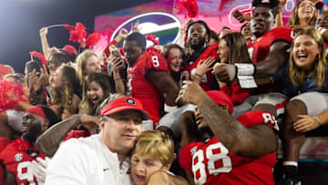 Georgia Bulldogs head coach Kirby Smart gives his son Andrew Smart, 8, a hug after defeating the Gators at TIAA Bank Field in Jacksonville, FL on Saturday, October 29, 2022 in the second half. Georgia defeated Florida 42-20. AndrewÕs birthday was Saturday. [Doug Engle/Gainesville Sun]Ncaa Football Florida Gators Vs Georgia Bulldogs