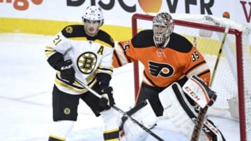 Jan 13, 2016; Philadelphia, PA, USA; Boston Bruins left wing Loui Eriksson (21) in front of Philadelphia Flyers goalie Steve Mason (35) during the third period at Wells Fargo Center. The Flyers defeated the Bruins, 3-2. Mandatory Credit: Eric Hartline-USA TODAY Sports