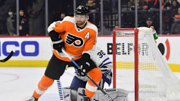 Nov 10, 2021; Philadelphia, Pennsylvania, USA; Philadelphia Flyers center Sean Couturier (14) against the Toronto Maple Leafs at Wells Fargo Center. Mandatory Credit: Eric Hartline-USA TODAY Sports