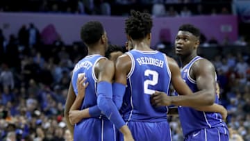 CHARLOTTE, NORTH CAROLINA - MARCH 15: Zion Williamson #1 and Cam Reddish #2 of the Duke Blue Devils huddle with teammates against the North Carolina Tar Heels during their game in the semifinals of the 2019 Men's ACC Basketball Tournament at Spectrum Center on March 15, 2019 in Charlotte, North Carolina. (Photo by Streeter Lecka/Getty Images)