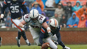 Auburn footballNov 23, 2019; Auburn, AL, USA; Samford Bulldogs lineman Gavin Orr (73) and Auburn football linebacker Chandler Wooten (31) scramble for a fumble during the first quarter at Jordan-Hare Stadium. Mandatory Credit: John Reed-USA TODAY Sports