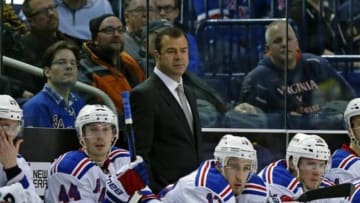 Mar 14, 2015; Buffalo, NY, USA; New York Rangers head coach Alain Vigneault watches play against the Buffalo Sabres during the second period at First Niagara Center. Mandatory Credit: Kevin Hoffman-USA TODAY Sports