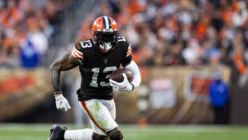 Oct 17, 2021; Cleveland, Ohio, USA; Cleveland Browns wide receiver Odell Beckham Jr. (13) runs the ball against the Arizona Cardinals during the fourth quarter at FirstEnergy Stadium. Mandatory Credit: Scott Galvin-USA TODAY Sports