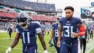 NASHVILLE, TN - DECEMBER 22: A.J. Brown #11 and Kevin Byard #31 of the Tennessee Titans jog off the field before a game against the New Orleans Saints at Nissan Stadium on December 22, 2019 in Nashville, Tennessee. The Saints defeated the Titans 38-28. (Photo by Wesley Hitt/Getty Images)