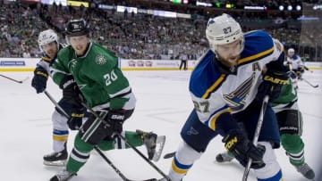 May 11, 2016; Dallas, TX, USA; Dallas Stars center Cody Eakin (20) and St. Louis Blues defenseman Alex Pietrangelo (27) battle for the puck during the second period in game seven of the second round of the 2016 Stanley Cup Playoffs at American Airlines Center. Mandatory Credit: Jerome Miron-USA TODAY Sports