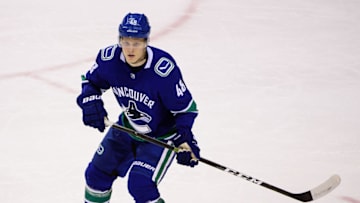 Sep 17, 2017; Vancouver, British Columbia, CAN; Vancouver Canucks defenseman Olli Juolevi (48) skates against the Las Vegas Knights during the first period at Rogers Arena. Mandatory Credit: Anne-Marie Sorvin-USA TODAY Sports