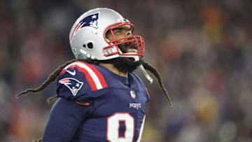 FOXBOROUGH, MA - NOVEMBER 04: Adrian Clayborn #94 of the New England Patriots celebrates after sacking Aaron Rodgers #12 of the Green Bay Packers (not pictured) during the second half at Gillette Stadium on November 4, 2018 in Foxborough, Massachusetts. (Photo by Maddie Meyer/Getty Images)