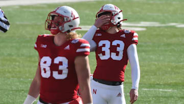 LINCOLN, NE - DECEMBER 12: Pace kicker Connor Culp #33 of the Nebraska Cornhuskers reacts after missing a field goal as tight end Travis Vokolek #83 watches in the game against the Minnesota Golden Gophers in the second half at Memorial Stadium on December 12, 2020 in Lincoln, Nebraska. (Photo by Steven Branscombe/Getty Images)