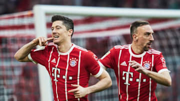 MUNICH, GERMANY - MARCH 31: Robert Lewandowski of Bayern Munich celebrates scoring a goal during the Bundesliga match between FC Bayern Muenchen and Borussia Dortmund at Allianz Arena on March 31, 2018 in Munich, Germany. (Photo by A. Pretty/Getty Images for FC Bayern )
