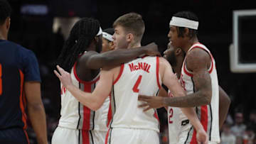 Feb 26, 2023; Columbus, OH, USA; Ohio State Buckeyes guard Sean McNeil (4) looks to the bench while meeting with teammates during NCAA basketball game Feb. 26, 2023 at Value City Arena. Mandatory Credit: Doral Chenoweth-The Columbus DispatchBasketball Ceb Mbk Illinois Illinois At Ohio State