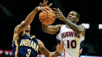 Oct 22, 2013; Atlanta, GA, USA; Indiana Pacers point guard George Hill (3) steals the ball from Atlanta Hawks point guard Royal Ivey (10) in the first half at Philips Arena. Mandatory Credit: Daniel Shirey-USA TODAY Sports