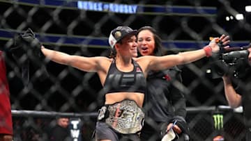 December 30, 2016; Las Vegas, NV, USA; Amanda Nunes celebrates her victory and championship retention against Ronda Rousey during UFC 207 at T-Mobile Arena. Mandatory Credit: Mark J. Rebilas-USA TODAY Sports