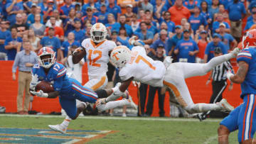 GAINESVILLE, FL - SEPTEMBER 16: Kadarius Toney #17 of the Florida Gators reaches for the football in front of Rashaan Gaulden #7 of the Tennessee Volunteers during the second half of their game at Ben Hill Griffin Stadium on September 16, 2017 in Gainesville, Florida. (Photo by Scott Halleran/Getty Images)