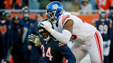 Chicago Bears outside linebacker Robert Quinn is blocked by New York Giants offensive tackle Andrew Thomas (78) during the second half at Soldier Field. Mandatory Credit: Jon Durr-USA TODAY Sports