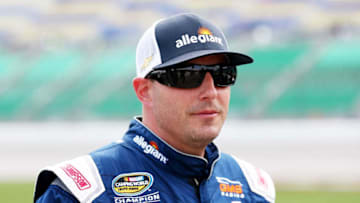 KANSAS CITY, KS - MAY 11: Johnny Sauter, driver of the #21 ISM Connect Chevrolet, stands on the grid during qualifying for the NASCAR Camping World Truck Series 37 Kind Days 250 at Kansas Speedway on May 11, 2018 in Kansas City, Kansas. (Photo by Sarah Crabill/Getty Images)