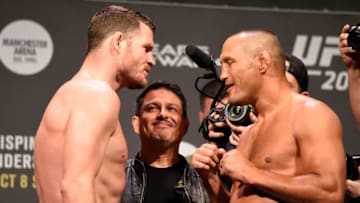 MANCHESTER, ENGLAND - OCTOBER 07: (L-R) UFC middleweight champion Michael Bisping and Dan Henderson of the United States face-off during the UFC 204 weigh-in at the Manchester Central Convention Complex on October 7, 2016 in Manchester, England. (Photo by Josh Hedges/Zuffa LLC/Zuffa LLC via Getty Images)