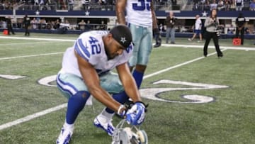 Dec 29, 2013; Arlington, TX, USA; Dallas Cowboys safety Barry Church (42) reacts after the game against the Philadelphia Eagles at AT&T Stadium. The Eagle beat the Cowboys 24-22. Mandatory Credit: Matthew Emmons-USA TODAY Sports