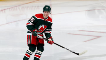 NEWARK, NEW JERSEY - APRIL 27: Jack Hughes #86 of the New Jersey Devils skates in the first period against the Philadelphia Flyers at Prudential Center on April 27, 2021 in Newark, New Jersey. (Photo by Elsa/Getty Images)
