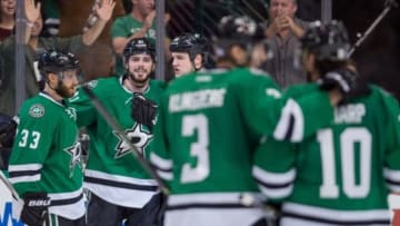 Oct 31, 2015; Dallas, TX, USA; Dallas Stars defenseman Alex Goligoski (33) and center Tyler Seguin (91) and left wing Jamie Benn (14) and defenseman John Klingberg (3) and left wing Patrick Sharp (10) celebrate the power play goal by Seguin against the San Jose Sharks during the third period at the American Airlines Center. The Stars defeat the Sharks 5-3. Mandatory Credit: Jerome Miron-USA TODAY Sports