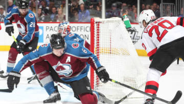DENVER, CO - MARCH 17: Erik Johnson #6 of the Colorado Avalanche looks to block a shot by Blake Coleman #20 of the New Jersey Devils at the Pepsi Center on March 17, 2019 in Denver, Colorado. The Avalanche defeated the Devils 3-0. (Photo by Michael Martin/NHLI via Getty Images)