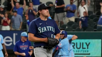 Aug 1, 2021; Arlington, Texas, USA; Seattle Mariners starting pitcher Erik Swanson (50) leaves the field after giving up a solo walk-off home run to Texas Rangers designated hitter Jonah Heim (not shown) during the ninth inning of a baseball game at Globe Life Field. Mandatory Credit: Jim Cowsert-USA TODAY Sports