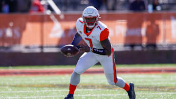 Feb 5, 2022; Mobile, AL, USA; American squad quarterback Malik Willis of Liberty (7) runs with the ball in the first half against the National squad at Hancock Whitney Stadium. Mandatory Credit: Nathan Ray Seebeck-USA TODAY Sports
