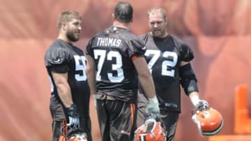 Jun 16, 2015; Berea, OH, USA; Cleveland Browns offensive lineman Alex Mack (55), Cleveland Browns offensive lineman Joe Thomas (73) and Cleveland Browns offensive lineman Mitchell Schwartz (72) during minicamp at the Cleveland Browns practice facility. Mandatory Credit: Ken Blaze-USA TODAY Sports