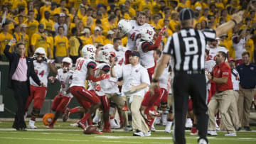 WACO, TX - SEPTEMBER 2: The Liberty Flames celebrate after defeating the Baylor Bears at McLane Stadium on September 2, 2017 in Waco, Texas. (Photo by Cooper Neill/Getty Images)