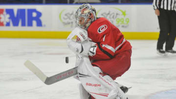 BRIDGEPORT, CT - NOVEMBER 11: Callum Booth #1 of the Charlotte Checkers makes a save during a game against the Bridgeport Sound Tigers at the Webster Bank Arena on November 11, 2018 in Bridgeport, Connecticut. (Photo by Gregory Vasil/Getty Images)