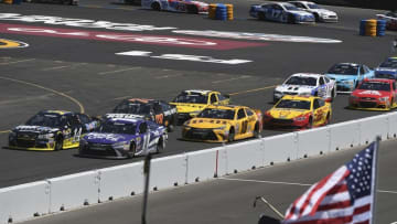 June 26, 2016; Sonoma, CA, USA; Sprint Cup Series driver Tony Stewart (14) and driver Denny Hamlin (11) race during the Toyota Save Mart 350 at Sonoma Raceway. Mandatory Credit: Kyle Terada-USA TODAY Sports