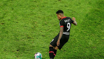 LEVERKUSEN, GERMANY - FEBRUARY 28: Leon Bailey of Leverkusen kicks the ball during the first Bundesliga match between Bayer 04 Leverkusen and Sport-Club Freiburg on Feb 28, 2021 in Leverkusen, Germany. (Photo by Mika Volkmann/Getty Images)