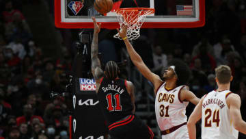 CHICAGO, ILLINOIS - JANUARY 19: DeMar DeRozan #11 of the Chicago Bulls shoots in the second quarter against Jarrett Allen #31 of the Cleveland Cavaliers at United Center on January 19, 2022 in Chicago, Illinois. NOTE TO USER: User expressly acknowledges and agrees that, by downloading and or using this photograph, User is consenting to the terms and conditions of the Getty Images License Agreement. (Photo by Quinn Harris/Getty Images)